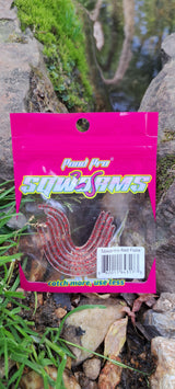 A package of Pond Pro Red Flake Sqworms, reusable soft plastic fishing baits, with a clear-bodied design loaded with bold red flakes.