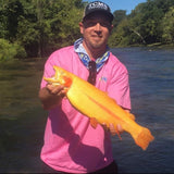 Pond Pro Guide, Tim Shannon, wading the Spring River in Arkansas holding a Golden Trout.