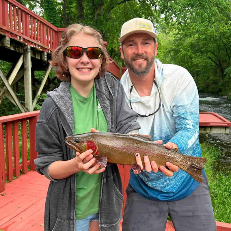 Pond Pro Tim Shannon and niece holding fish caught at Dry Run Creek in Arkansas