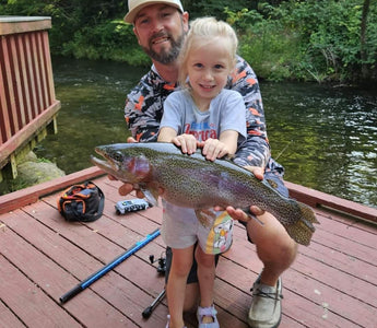 girl at dry run creek in arkansas on the dock with fish she caught