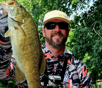 Pond Pro Guide Tim Shannon holding bass